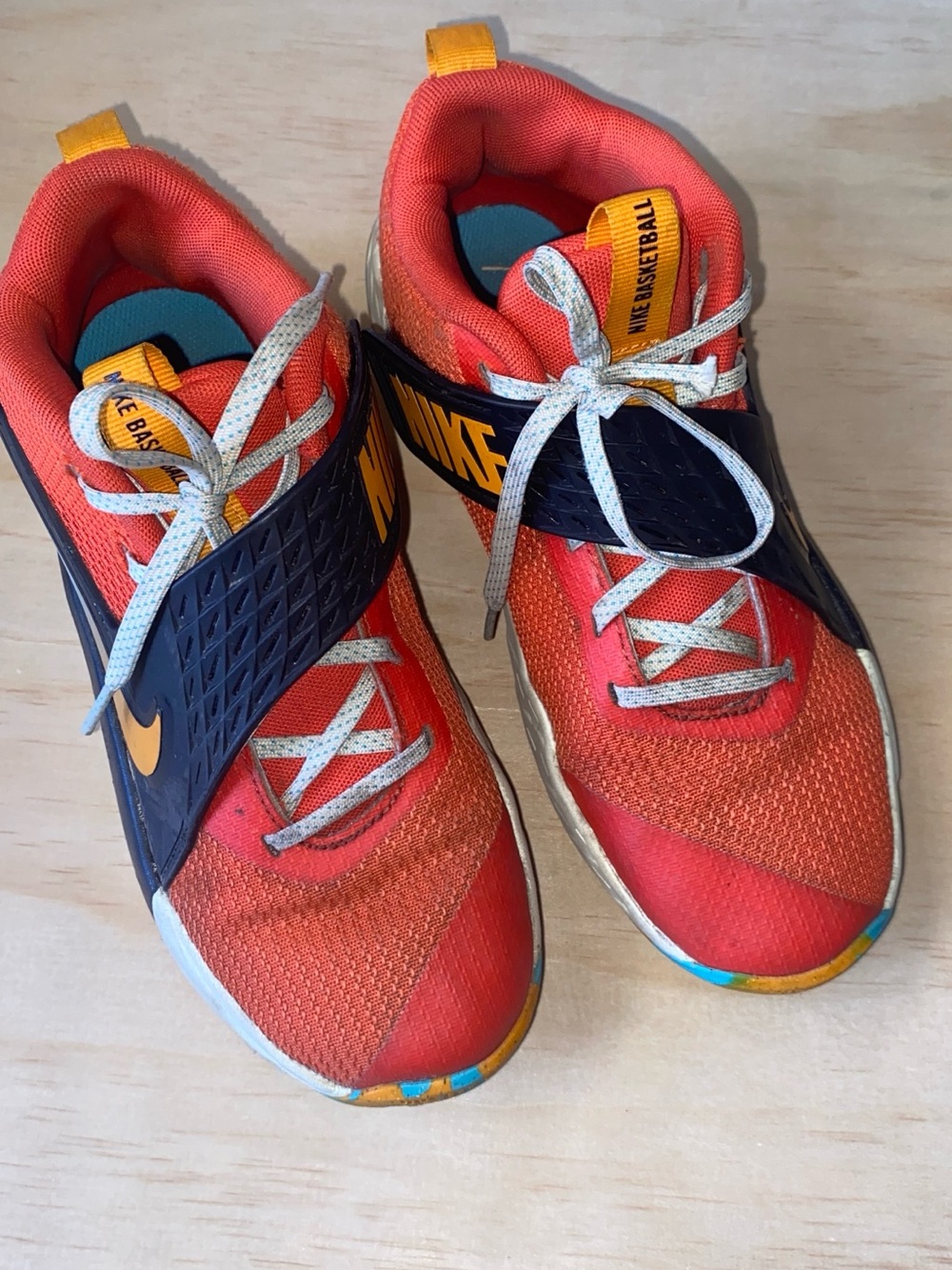 Nike Kids Red and Navy Basketball Sneakers with Yellow Accents